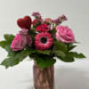 Charming Arrangement with green Hydrangea, green Spider Mums, Roses, Orchids, Anemones and