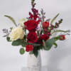 Elegant, clean and traditional. Red and white with greens, arranged in a
