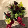 Luxurious gift basket for Christmas with a beautiful arrangement, champagne, old fashion