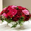 A lush, compact masterpiece, this arrangement is a pav&eacute; of Roses in