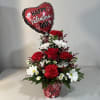 This mixed fresh flower arrangement features a Valentine's Day balloon. Supply items