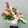 This arrangement is uniquely crafted with complete elegance in mind. Who doesn't