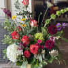 This arrangement is uniquely crafted with the freshest florals. Florals may vary