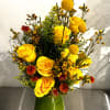 The Sunray Reminisce arrangement captures the golden warmth of summer, evoking a