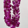 Our popular Double  Orchid Hawaiian LeI is distinctive and unique everything