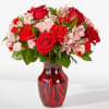 As sweet as candy, this pink and red arrangement is sure to