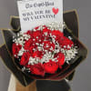Striking bouquet featuring 12 premium red roses, imported from Ecuador, wrapped in