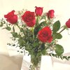 1/2 dozen gorgeous red roses, vased beautifully with greens and a few