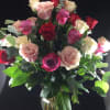 Two dozen mixed color premium roses, sure to bring a smile and