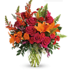 Bold display of bright orange and hot pink flowers - lily, roses