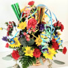 A mix of long-lasting flowers in bright colors with party horns and