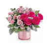 A lovely mix of hot pink and blush roses, mini carnations, alstroemeria