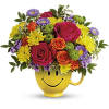 Happiness, delivered! Colorful roses in a cheerful ceramic mug are the quickest