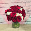 EXQUISITE  GARDEN ROSES NATURAL AND TRADITIONALLY ARRANGED IN A LOW AND