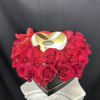 A heart-shaped box with 36 roses and a heart-shaped chocolate box in