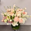 Blush Symphony is a premium Valentine&rsquo;s Day arrangement designed with the finest