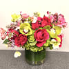 A bold and luxurious Valentine&rsquo;s arrangement featuring green hydrangea, hot pink garden