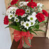 Daisies and red Carnations make this a great arrangement for your sweetheart!