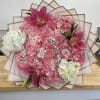 Buyer will receive a beautiful bouquet with pink carnations, pink Lillie&rsquo;s and
