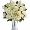 A shining tribute to a life well lived, this pure white bouquet
