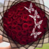 Elegant bouquet to win someone's heart. Red roses, bouquet with butterfly, personalized