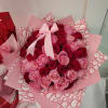 Red and pink roses and Dior wrapping, personalized ribbon, balloons and chocolate