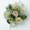 Wrist corsage. Please specify colors that you would like.  We love