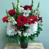 A truly breathtaking tribute to your love, this romantic arrangement bursts with
