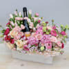 A beautiful bed of pink flowers to showcase your favorite bottle of