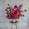 Bold and vibrant, the Bloody Mary arrangement brings a touch of autumn