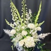 Large design of pure white flowers and dried floral elements. Will pacify
