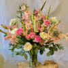 Theme Colors: Shades peach and white.

Featured Blooms: Roses, Gladiolus, lilies,  and