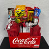 Nothing beats a classic! This charming Coca-Cola themed gift includes refreshing bottled
