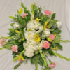 A graceful standing easel arrangement designed to express sympathy, honor, and heartfelt