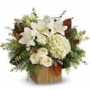 Designed in a chic wooden cube or birch container, this extraordinary bouquet