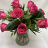   A fun, vibrant departure from softer pink roses, 