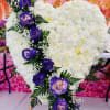 This is a medium heart with purple roses.