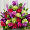 A lovely way to say, "farewell," this bright, beautiful arrangement expresses your