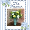 The Dreamer features a fresh mix of seasonal blooms in soft, cheerful