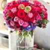 Sweet Tender is a mix floral in shades of hot pink, red