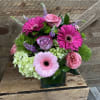 LOVE THIS ONE! Gerbera daisies, hydrangea, veronica and roses. Designed compact in