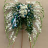 A very creative flower arrangement made into an angel wings with this