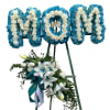 Beautiful display lettered MOM.
DISCLAIMER: FLOWERS MAY BE SUBSTITUTED IF NEEDED.