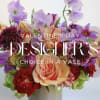 Let our talented team design a fresh seasonal floral piece in a
