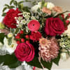 This bouquet features shades of pink varying from hot pink to light