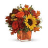 Bring the golden glow of autumn indoors with this cheerful sunflower and
