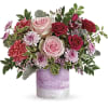Pink roses, dark pink spray roses, pink carnations, lavender cushion spray chrysanthemums