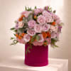 Beautiful pink and orange arrangement in a box 
