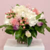 Trust our designers to create their magic with the prettiest pastel flowers