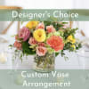 Our talented designers will create a custom arrangement using the season's freshest